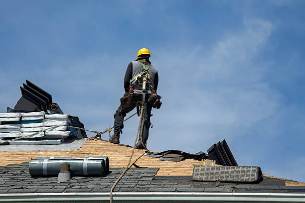 Professional Roof Repair technician working in Kingston, OH